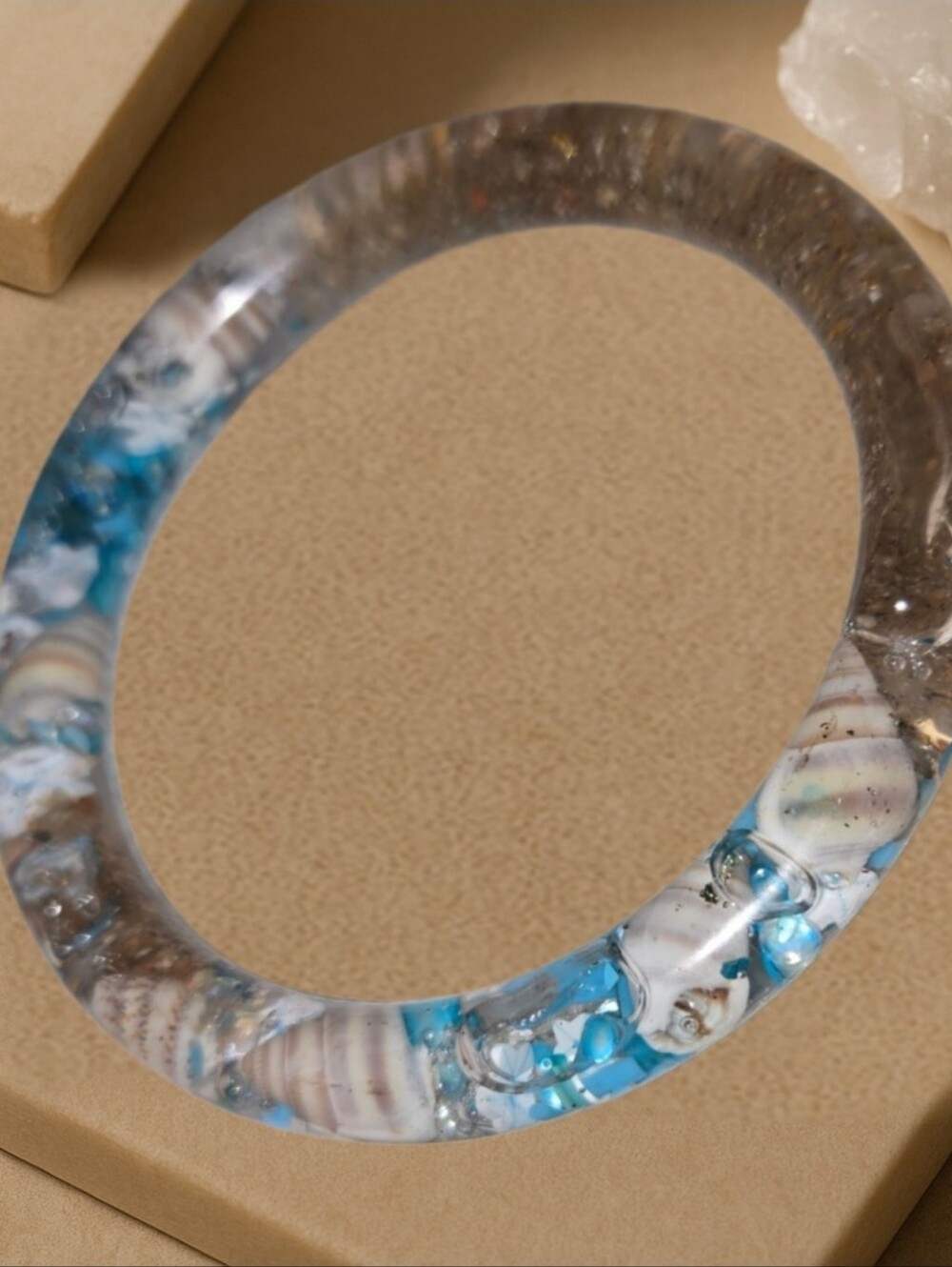 Resin Bangle Bracelet with Embedded Shells in Blue and Cream